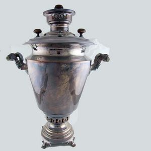 Plated 19th century tea urn and cover. 49 cm high.