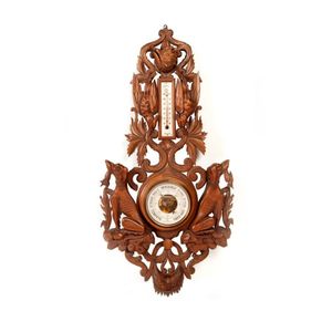 A good wall barometer and thermometer, carved with hunting dogs…