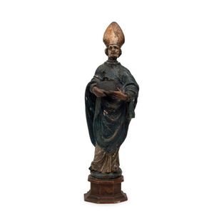 An Italian statue of a Bishop, polychrome carved wood, 18th…