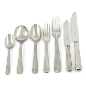 A boxed Christofle stainless steel cutlery suite, Laguna…