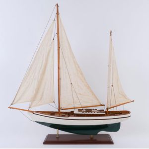 A hand-built model yacht on stand, late 20th century, 78 cm high