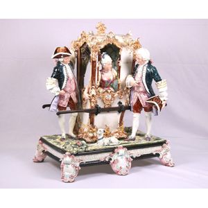 A Dresden porcelain group modelled of a lady in sedan chair…