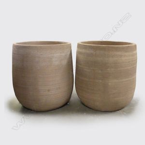 A pair of large ovoid garden pots, fine textured unglazed…