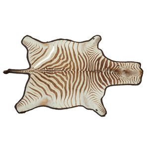 A vintage zebra skin, 305 x 188 cm. Provenance: from the…