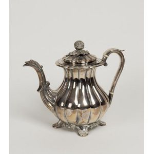 An Antique Sheffield plate fluted coffee pot with persimmon…