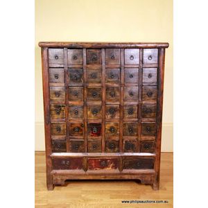 A Chinese apothecary cabinet, of rustic form, with a mitred…