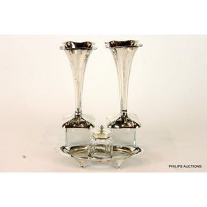 A Victorian sterling silver inkwell stand & a pair of…