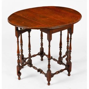 An oak gate leg Sutherland table, English early 19th century 64…