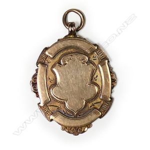 Frank Grady 9ct gold 1925 fob medallion, vacant shield front,…