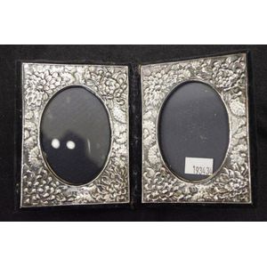 Pair Elizabeth II sterling silver photo frames London 1988,…