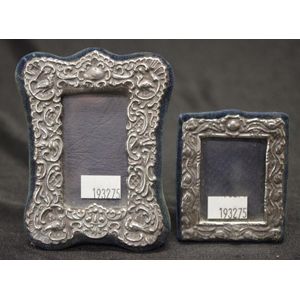 Two vintage sterling silver photo frames each with hallmarked…