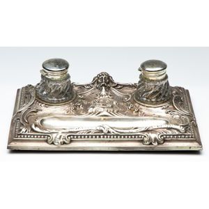 A Continental silver ink well featuring repousse figurehead and…