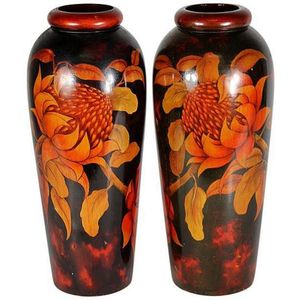 Pair of Australian timber pokerwork waratah vases, painted in…