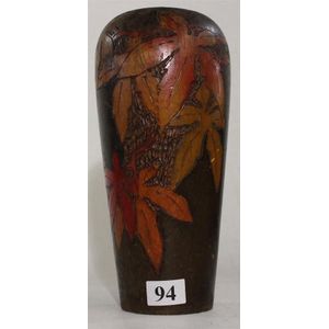 An Australian pokerwork timber vase, with leaf design. Height…
