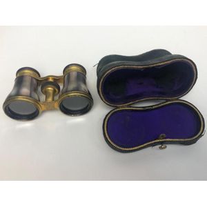 A pair of mother of pearl opera glasses by Le Maire Fabi,…