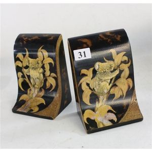 A pair of Australian pokerwork timber bookends, with koala…