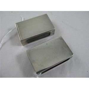 Two sterling silver lady's matchbox holders. First with…