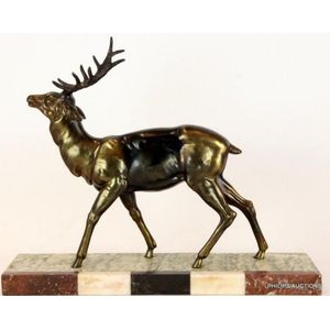An Art Deco spelter stag, circa 1930, the imposing walking stag…
