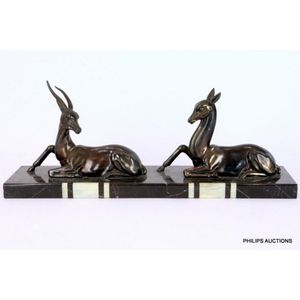 An Art Deco spelter deer group, circa 1930, the recumbent…