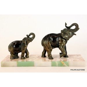 An Art Deco spelter elephant group, circa 1930 the trumpeting…