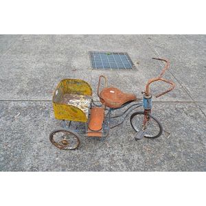 vintage tricycle with back seat