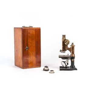 Microscope: antique brass, housed in original timber case with…