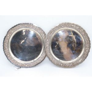 Pair of 800 silver salvers, embossed floral design to boarder,…