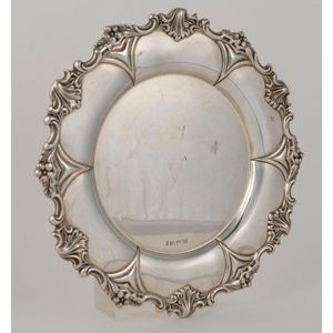 A sterling silver salver with floral border, made in Sheffield…