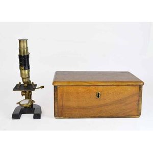 An antique boxed microscope, c.1890's; possibly French, with…