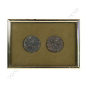 A pair of framed German propaganda medals, marking the sinking…