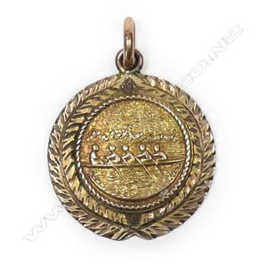 A N.Z. Kohn of Auckland gold rowing medal, engraved 'W.B.C.…