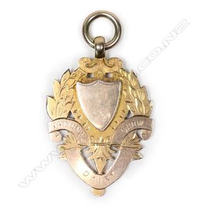 An N.Z. colonial 9ct gold 'NATIONAL DAIRY SHOW' fob medallion,…
