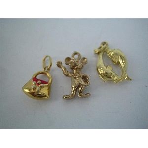 A 14ct gold Pisces charm and Mickey Mouse charm, an another.…