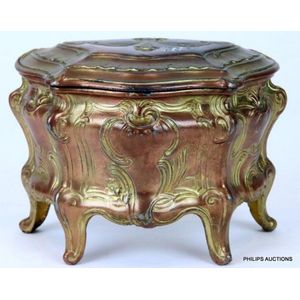 A French gilt spelter jewellery casket, in the form of a Louis…