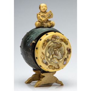 An early ivory and mother of pearl inlaid barrel form figural…