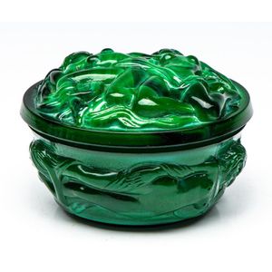A malachite glass nude relief trinket box, diameter 9.5 cm