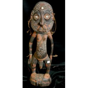 A Sepik ancestor sculpture of wood, classic male form,…