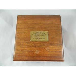 A Gilbert & Sons, London, sundial and compass in timber case