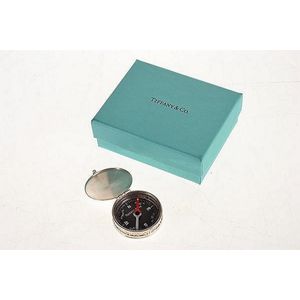 A compass by Tiffany & Co., from the 'Atlas' collection, styled…