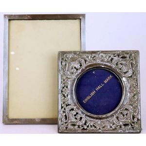 Two sterling silver photo frames, one square with pierced…