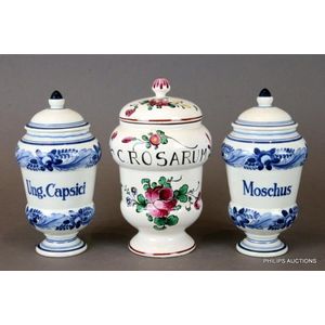 Three French apothecary lidded jars, circa 1950s, the jars with…