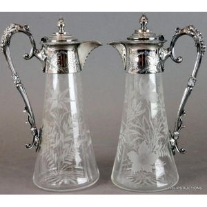 A pair of Victorian silver plate mounted claret jugs, circa…