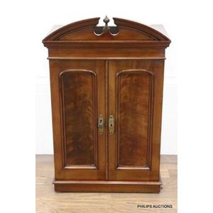 A Georgian revival mahogany apprentice cupboard, early 20th…