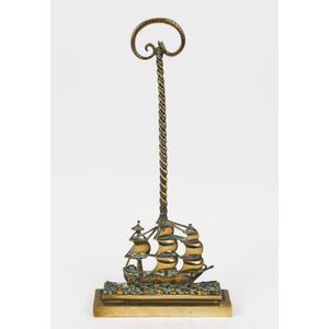 An antique cast brass doorstop in the form of a galleon, 19th…