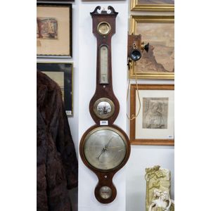 An antique English 8 inch wheel barometer in mahogany case with…