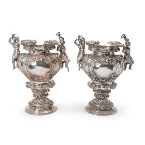 A large pair of Victorian silver plate urns by Martin Hall & Co,…