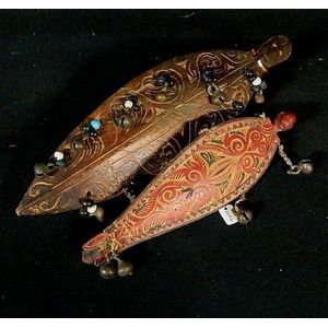 Two Dayak toy shields of wood with bell attachments 31 cm, 22 cm