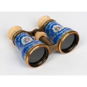 A pair of antique French opera glasses with blue floral enamel…