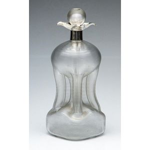 An unusual heavily textured kluk kluk decanter with London…