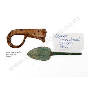 A Roman fire lighter and a Cooper arrow head from Peru